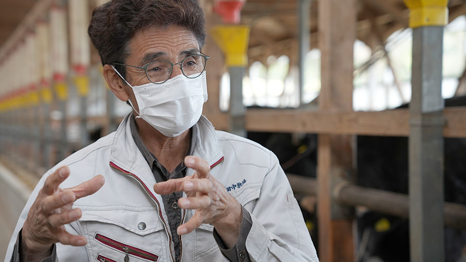 話をする田中さん